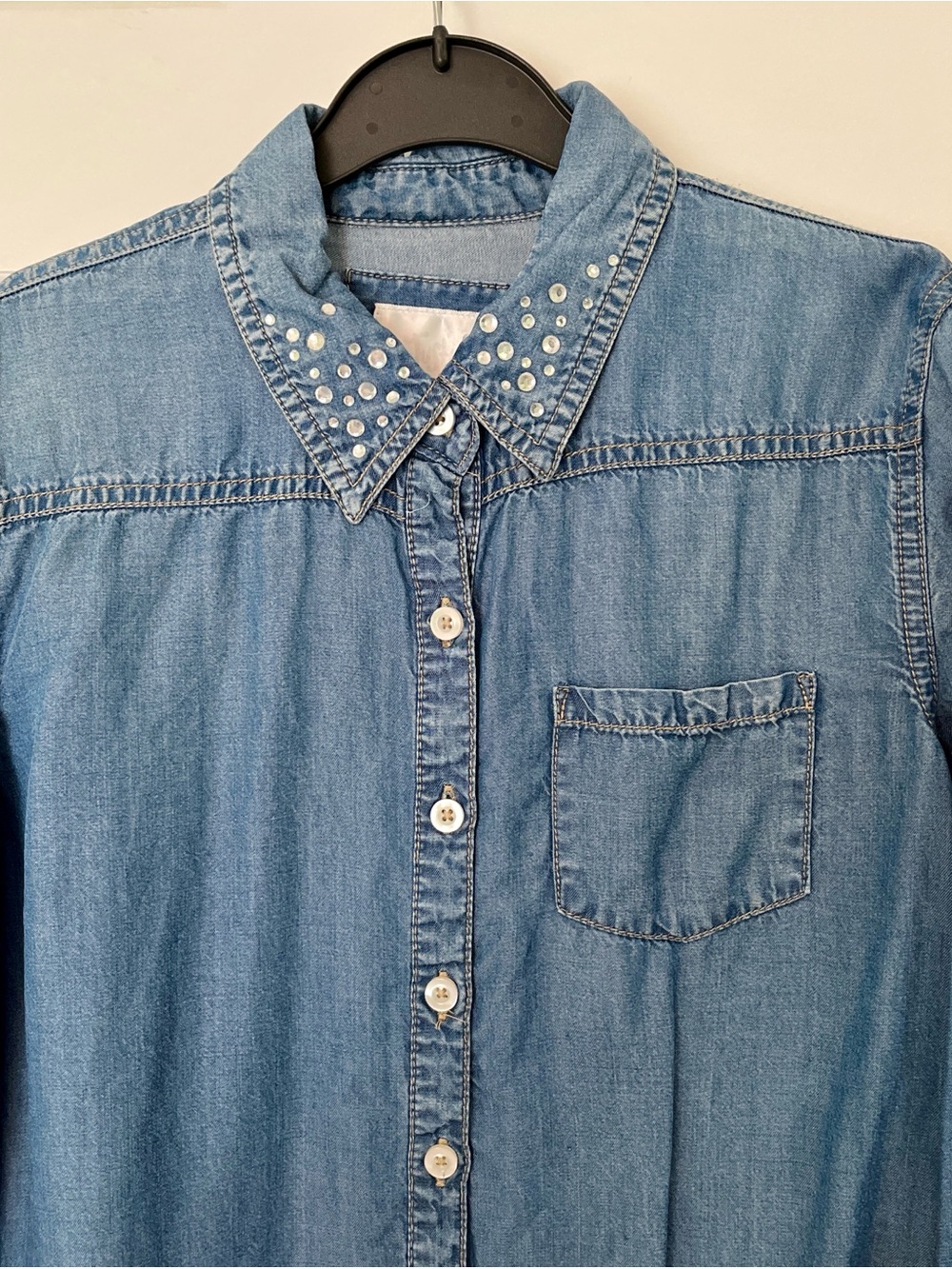Justice light blue denim top with white label accents